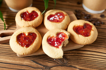 Cookies with hearts close-up on wooden background. 