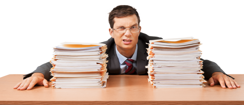 Portrait of an Unhappy Employee Behind a Stack of Documents