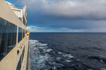 Breathtaking sunrise sunset twilight blue hour dusk dawn cloud horizon nature landscape scenery at sea seen from cruiseship cruise ship ocean liner panorama during transatlantic crossing