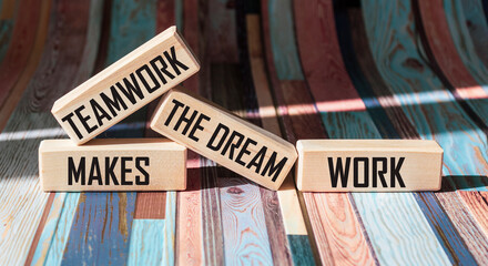 Concept words TMDW Teamwork make a dream job on a wooden block on a beautiful vintage background. Teamwork Business TMWD creates a dream job concept.