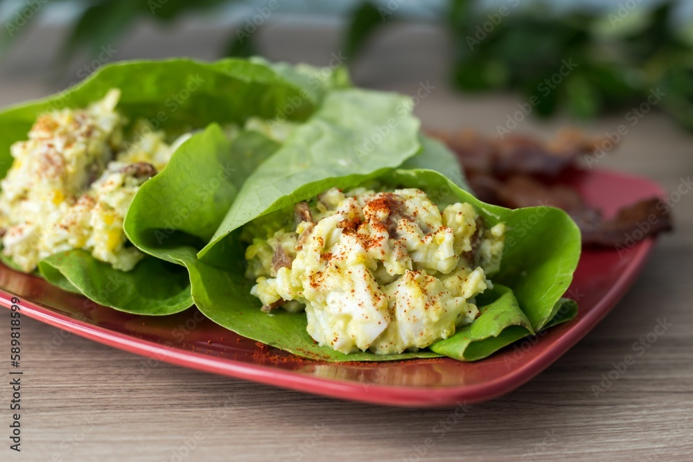 Wall mural plate with egg salad wrapped in lettuce