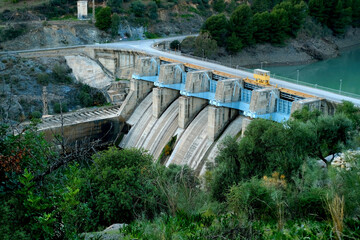 dam on Turon river, Reservoir Condo del Guadalore, hydroelectric power plant, source using energy water stream, mountain resort El Chorro gorge, mountains andalusia, concept ecology, clean energy