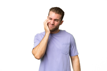 Young handsome caucasian man isolated on green chroma background with toothache