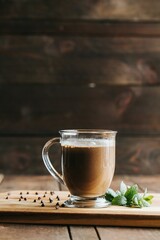 Vertical shot of a hot chocolate on the wooden background