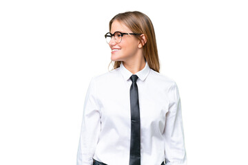 Young business caucasian woman over isolated background looking side