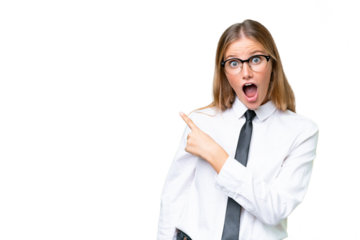 Young business caucasian woman over isolated background surprised and pointing side