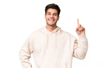 Young caucasian handsome man over isolated background showing and lifting a finger in sign of the best