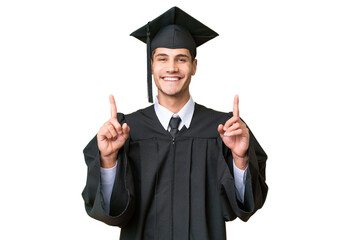 Young university graduate caucasian man over isolated background pointing up a great idea
