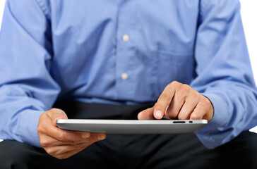 Businessman and tablet pc   on  background