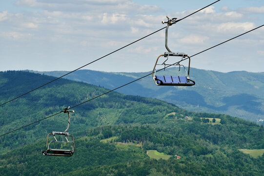 bottom view of the cable car carriages and the sky in the Polish mountains