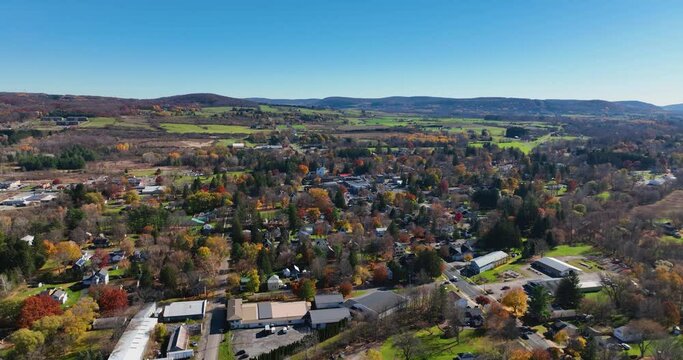 Afternoon fall, autumn aerial drone video of the area around Dryden New York, USA.