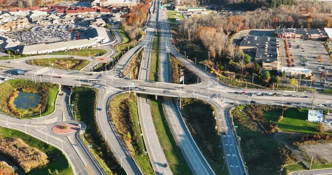 Aerial, drone, afternoon video of a diverging diamond interchange (DDI), located in Woodbury, NY