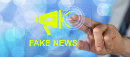 Man touching a fake news concept