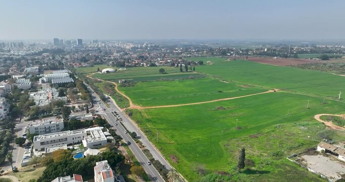 Aerial footage of the fields in the north of Kfar Saba city. Filmed in C4K Apple ProRes 422 HQ