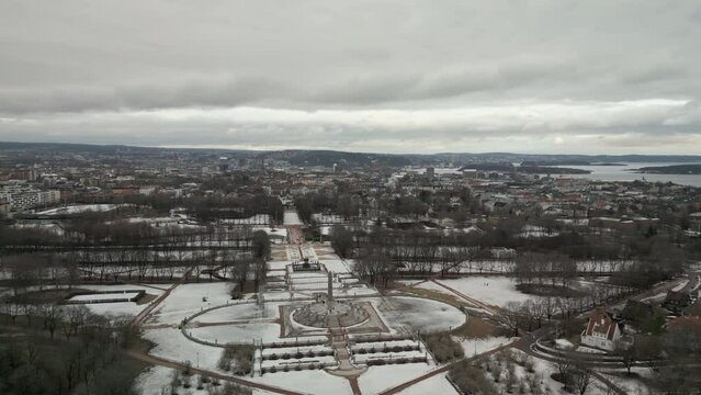 Touristic Frogner Park in Oslo covered in winter snow - aerial view