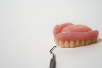 Dentures and dental tool for dentistry care