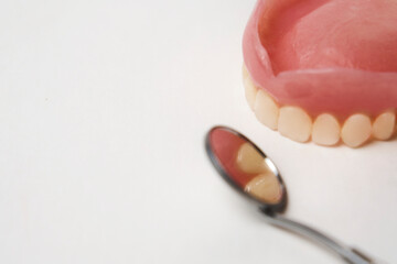 Dentures and dental tool for dentistry care