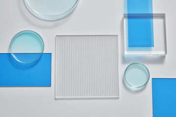 Flat lay of assorted laboratory glassware equipment showcase on white background. Concept of...