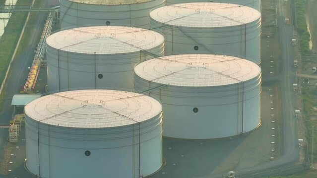 From an aerial view, an oil depot usually appears as a large industrial complex with multiple storage tanks, pipelines, loading and unloading areas, and other supporting infrastructure. Drone 4K
