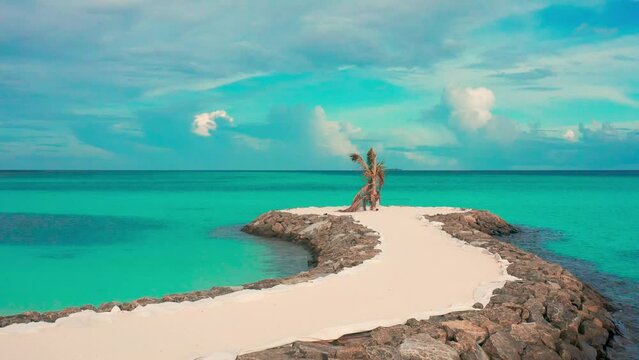 Aerial view on coast beach on local island Fulidhoo at sunset time in Maldives