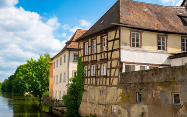 Fototapeta na wymiar Old houses and Regnitz river in Bamberg old city center