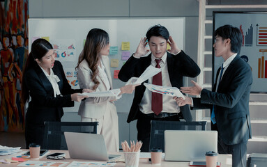 Businessperson is pressured by coworkers to do multitask in order to meet deadlines but feels overwhelmed and confused. Stress at work coupled with a lack of guidance and support from colleagues.