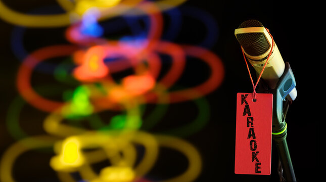 Vintage Microphone With Bokeh Light trails, Karoke,Entertainment,Music Concept,Close up Shot with Bokeh Balls, Good Copy Space.