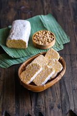 raw tempeh on wooden table
