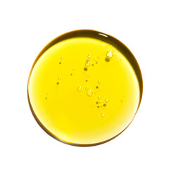 Drop of yellow oil swatch texture in petri dish macro with bubbles, cosmetics for face and body,...