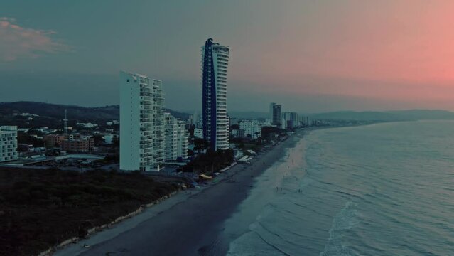 Aerial of Tonsupa beach at sunset in Ecuador.