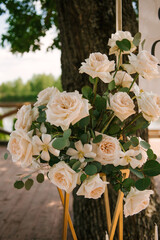 Holiday or wedding decor with beautiful compositions of white roses