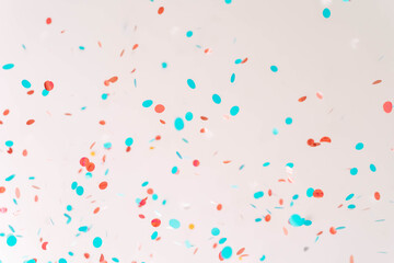 Abstract background with multicolored confetti.