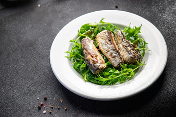 salad sardine fresh green leaves  seafood snack meal food on the table copy space food background rustic top view  