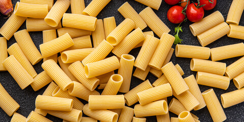 pasta rigatoni raw ingredient meal food snack on the table copy space food background rustic top view