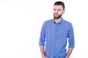 Fototapeta premium Strong, confident, handsome and bearded man in casual checkered shirt is posing isolated on white background with copy space for text and advertising