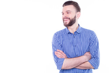 Obraz premium Strong, confident, handsome and bearded man in casual checkered shirt is posing isolated on white background with copy space for text and advertising