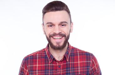 Obraz premium Strong, confident, handsome and bearded man in casual checkered shirt is posing isolated on white background with copy space for text and advertising