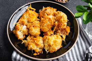 cauliflower with cheese baked vegetable meal food snack on the table copy space food background rustic top view 