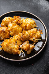 cauliflower with cheese baked vegetable meal food snack on the table copy space food background rustic top view 