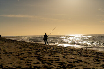 FISHER AT THE OCEAN SUNRISE SILHOUETTE (Golden Hour Style)