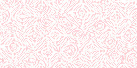 Seamless hand drawn concentric sun ray circles pattern in pastel pink and white. Abstract barnacle or coral sea life motif background texture. Trendy baby girl blanket, clothing or nursery wallpaper.