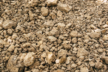 Brown ground soil surface. Texture pattern background.