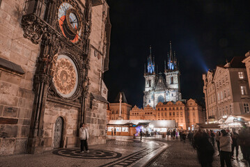 The old town square of Prague - one of the main touristic spots in the city. The gothic Church of Our Lady, unique architecture and astronomical clock.