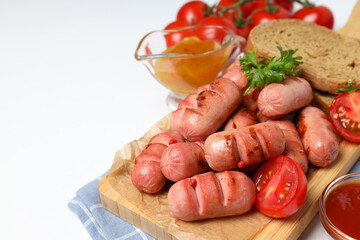 Concept of tasty food, grilled mini sausage, space for text