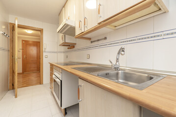 Small furnished kitchen without washing machine or dishwasher