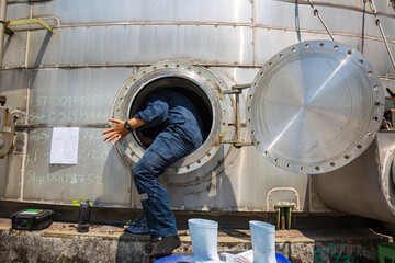 Male into the manhole  tank stainless chemical area confined space