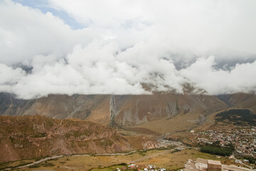 Caucasian mountains in the clouds