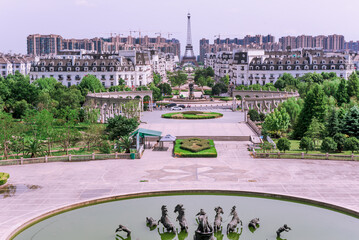 the Window of the World. It is a theme park opened in 1993 and has more than 130 reproductions of famous places in the world. Tianducheng, China is suburb of Hangzhou, Zhejiang