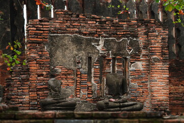 Ruins of old monks from the Ayutthaya period, which was the capital of Thailand in the past, but...