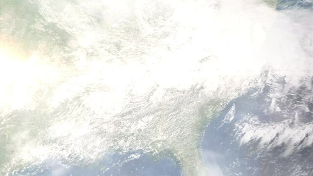 Earth zoom in from outer space to city. Zooming on Dalton, Georgia, USA. The animation continues by zoom out through clouds and atmosphere into space. Images from NASA
